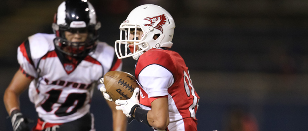 Blaise Manabe ran after a catch against Radford in an OIA White game on Sept. 6, 2013. (Darryl Oumi / Special to the Star-Advertiser)