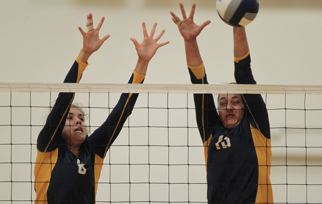 Punahou's Mariah Rigg, left, and McKenna Granato went up for a block against Mira Costa. (Dennis Oda / Star-Advertiser)