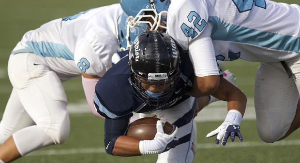 Kainoa Simao dived forward against St. Francis. (Cindy Ellen Russell / Star-Advertiser)