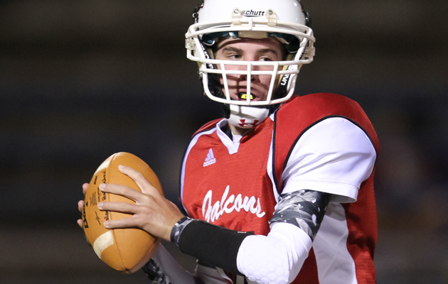 Kalani quarterback Noah Brum looked downfield against Radford on Friday night at Kaiser High. (Darryl Oumi / Special to the Star-Advertiser)