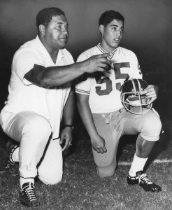 Kale Ane, right, learned his football at the knee of his father, Charlie Ane. SB file photo by Jack Matsumoto