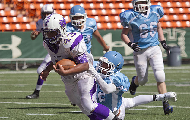Edwin Aumua leads Damien with four rushing touchdowns. Honolulu Star-Advertiser photo by Cindy Ellen Russell