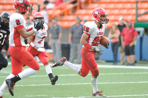 Scott-Isaac Medeiros-Tangatailoa scores a touchdown for Lahainaluna in last year's Division II state final against ‘Iolani. (Bruce Asato / Star-Advertiser)