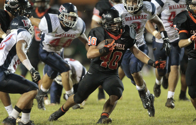Campbell's Austin May tried to outrun Waianae's defense on Friday night. (Jamm Aquino / Star-Advertiser)