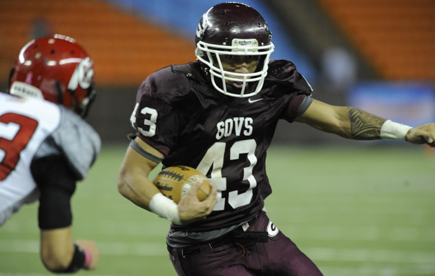 Sanele Lavatai leads Farrington in rushing. (Bruce Asato / Star-Advertiser) 