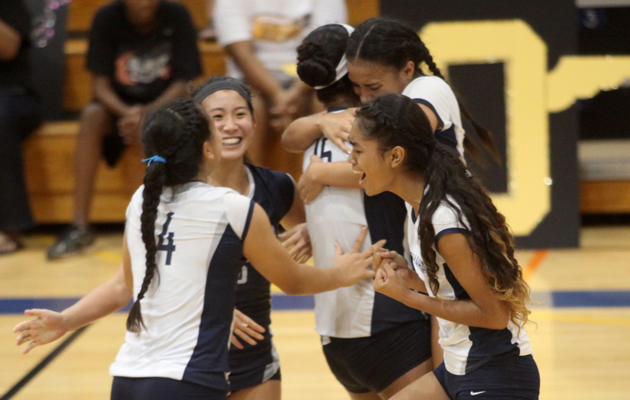Kamehameha players celebrated their ILH championship on Thursday night. (Kat Wade / Special to the Star-Advertiser)
