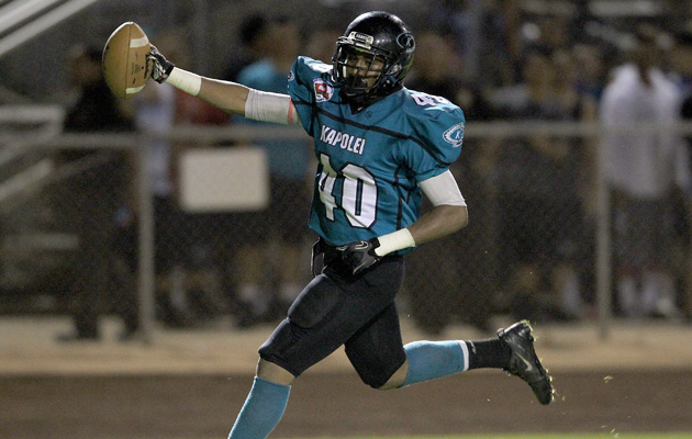 Kapolei's Alika Sene-Bailey celebrated a touchdown against Kailua on Friday night. (Jay Metzger / Special to the Star-Advertiser)
