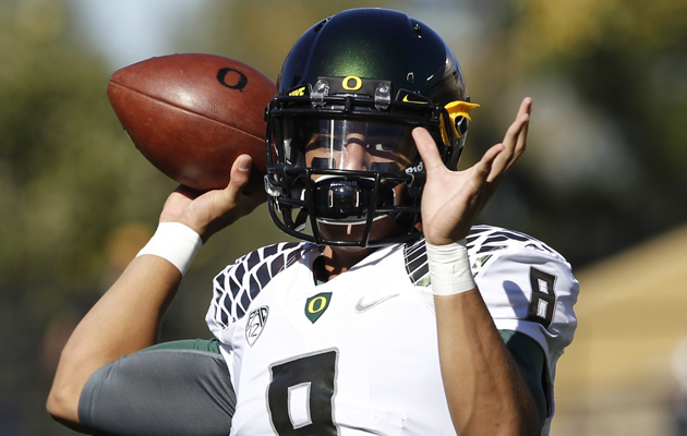 Saint Louis alum Marcus Mariota accounted for a career-high seven touchdowns for Oregon on Saturday. (Associated Press)