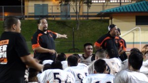 Campbell coach Amosa Amosa talks with his team after a win over Hilo. (Paul Honda / Star-Advertiser)