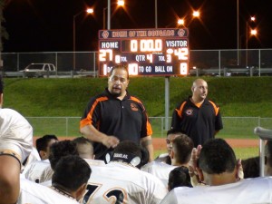Campbell coach Amosa Amosa talks with his team after a win over Hilo. (Paul Honda / Star-Advertiser)