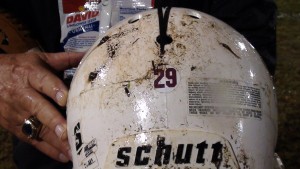 A Konawaena helmet bears a maroon "29" in memory of Farrington's Dayne Ortiz. (Paul Honda / Star-Advertiser)