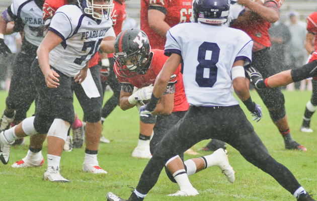 Kanoa Iwasaki ran through Pearl City's defense for Kauai’s first touchdown. (Ron Kosen / Special to the Star-Advertiser)