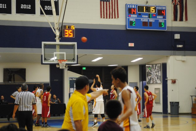 Maryknoll coach Kelly Grant dispels some wisdom during an early free throw.