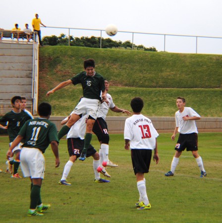 Mid-Pacific's Payton Boyd went up for a header against Hawaii Prep.