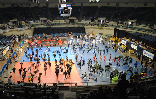Wrestlers prepare for battle on the first day of the HHSAA Chevron state wrestling championships.