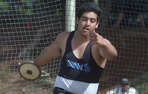 Word of Life's Brashton Satele repeated as champion in 2004 and 2005 and came within two inches of the state meet record. Photo by Cindy Ellen Russell.