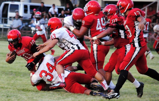 Kahuku's defense was up to its usual bag of tricks on Friday, making life difficult for quarterback Tuli Wily-Matagi.