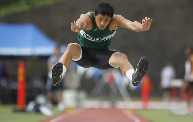 SPT - University High's Reece Alvarado competes in the boys long jump event during the 2014 HHSAA Track and Field Championships on Saturday, May 10, 2014 at Kamehameha-Kapalama Schools in Honolulu.  (The Honolulu Star-Advertiser/Jamm Aquino).