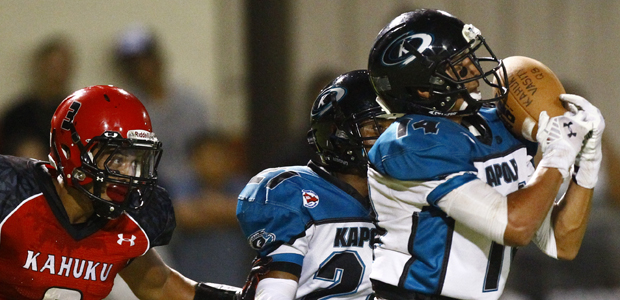 Kapolei's Jay Amina intercepted a pass intended for Kahuku's Keala Santiago on Aug. 15. (Jamm Aquino / jaquino@staradvertiser.com)