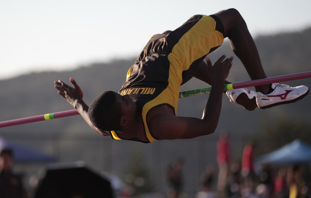 Mililani's Khalil Stevens attemped a jump at of 6-feet, 9 1/4 inches in the boys high jump.