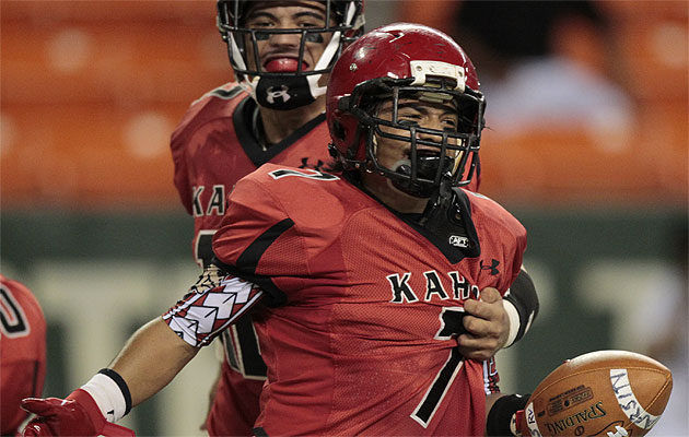 Kahuku's Kawehena Johnson came up huge against Farrington in 2012 with nine tackles, two touchdowns, an interception and a forced fumble. Star-Advertiser file photo.