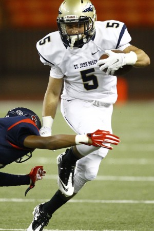 St. John Bosco's Sean McGrew gets around St. Louis' Jalen Saole on Friday. Honolulu Star-Advertiser/Jamm Aquino