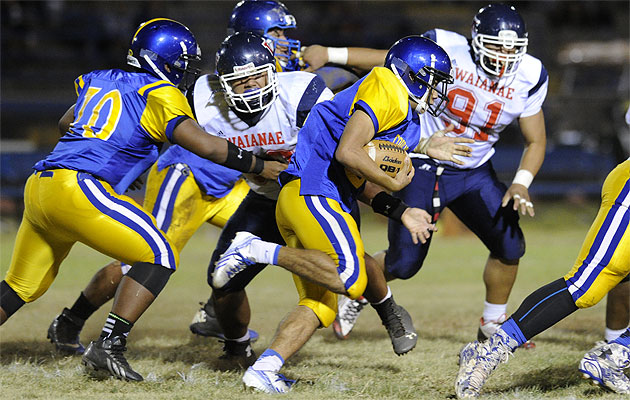 Kaiser's Jensen McDaniel is the only Cougar ever to run for more than 100 yards in a game against Waianae, doing it twice in two years. Bruce Asato / Honolulu Star-Advertiser.