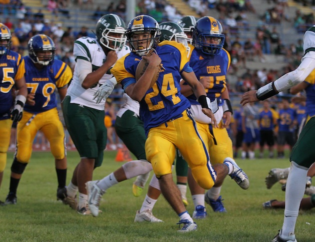 Kaiser's Jensen McDaniel is tops among all Oahu schools with 483 rushing yards in three games. Photo by Darryl Oumi/Special to the Star-Advertiser