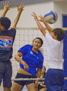 Lia Gaogao gets better by competing against players like Austin Matautia (left) and Addison Enriquez. Dennis Oda / Star-Advertiser.