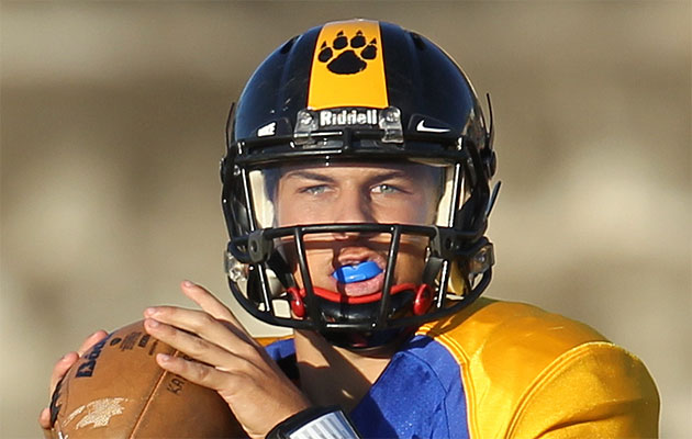 Kaiser quarterback Kalawai'a Judd has only completed 47 percent of his passes and has thrown more interceptions (5) than touchdowns (4) but seems to be getting better every week. Photo by Darryl Oumi, Special to the Star-Advertiser.