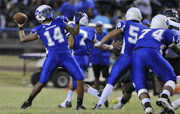 Kailua's Martin Tigilau threw a long pass to Kailua's Koolauloa Gaspar for a touchdown against Aiea on Saturday. HSA photo by Bruce Asato