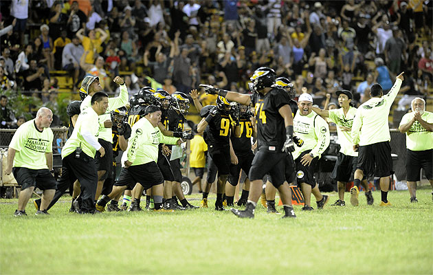 The Nanakuli bench reacts after the defense recovered a Pearl City fumble. HSA photo by Bruce Asato