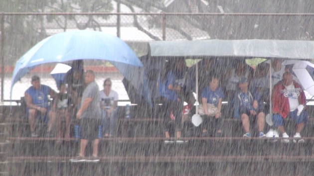 True blue. Moanalua fans waiting out the JV game rain delay. 