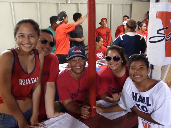 Coach Delveen Angeles-Eli, center, has boundless energy, love and culinary skills, all of which make the lives of her paddlers at Waianae High School that much more interesting. 