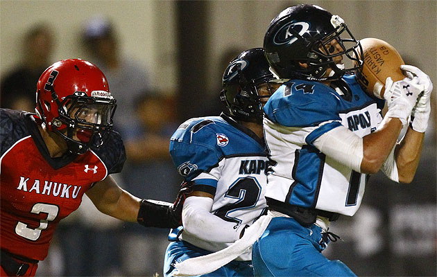 Kapolei's Jay Amina intercepted a pass intended for Keala Santiago in the season opener. The Hurricanes return to Kahuku in the second round of the OIA playoffs. Jamm Aquino / Honolulu Star-Advertiser