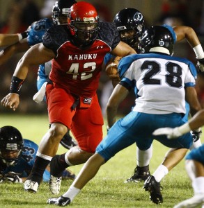 Bryson Hughes and Kapolei won't be intimidated when Kahuku's Salanoa Alo-Wily bears down on it on Friday. Jamm Aquino / Star-Advertiser.