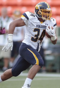 Punahou running back Wayne Taulapapa didn't need to get much work in to bury Pac-Five on Friday. Krystle Marcellus / Star-Advertiser.