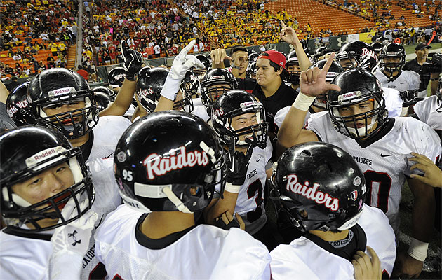 Iolani football players celebrate their win over Lahainaluna. Bruce Asato / Star-Advertiser