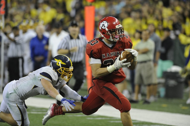 Kahuku used the legs of running back Aofaga Wily to beat Punahou in the 2012 Division I state final. Photo by Bruce Asato/Star-Advertiser