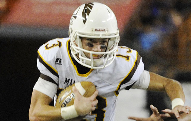 McKenzie Milton is the latest quarterback to reach 6,000 career passing yards. Photo by Bruce Asato/Star-Advertiser.