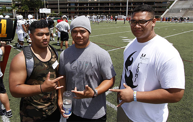 Pena Fitisemanu (Punahou), Salanoa-Alo Wily (Kahuku) and Semisi Uluave (Punahou) took in a UH scrimmage earlier this year. Dennis Oda / Star-Advertiser