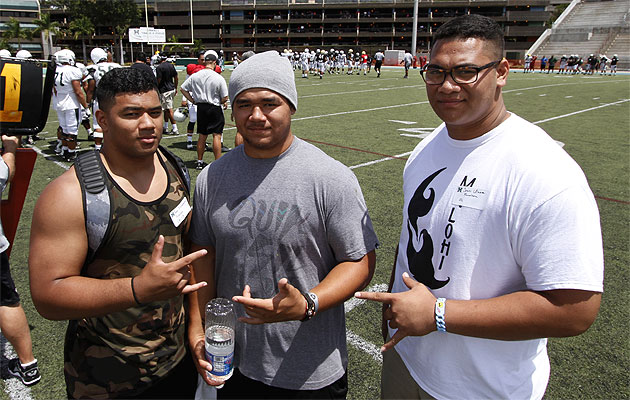 Pena Fitisemanu (Kahuku), Salanoa Alo Wily (Kahuku) and Semisi Uluave (Punahou) took in a UH scrimmage earlier this year. Dennis Oda / Star-Advertiser