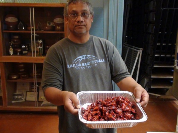 As good as it looks: char siu chicken, freshly cooked by Louis Scheer and modeled by Kailua JV coach Chuck Auld. FOUR STARS! (Photo: Paul Honda)