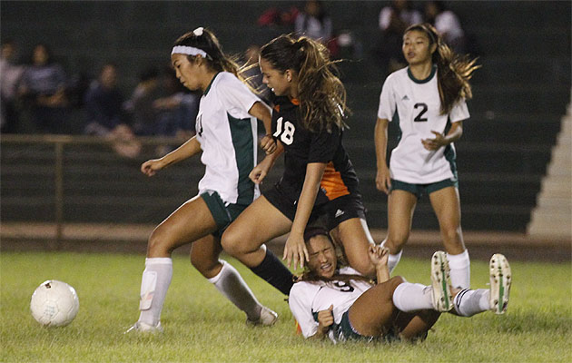 Campbell's Ashlynn Chargualaf charges forward to gain possession against the Aiea Na Alii's Tamera Mikamura while Tiana Ono recovered on Tuesday. Krystle Marcellus / Star-Advertiser