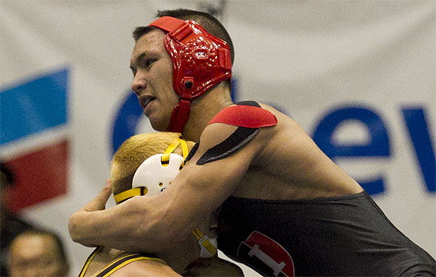 KJ Pascua helped ‘Iolani to the boys team title with a victory in the 170-pound final. Cindy Ellen Russell / Honolulu Star-Advertiser.