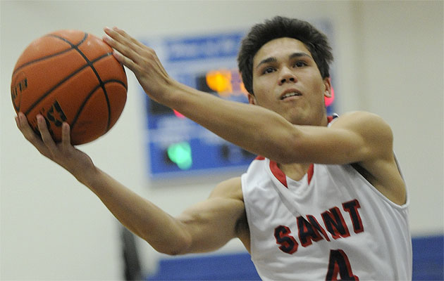 aint Louis’  Kevin Marks puts up a shot between Roosevelt defenders Valen Inaura and Keanu Furtado on Friday. Bruce Asato / Star-Advertiser