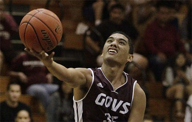 Farrington's Pono Kakalia scores against McKinley  on Saturday. Star-Advertiser photo by Krystle Marcellus