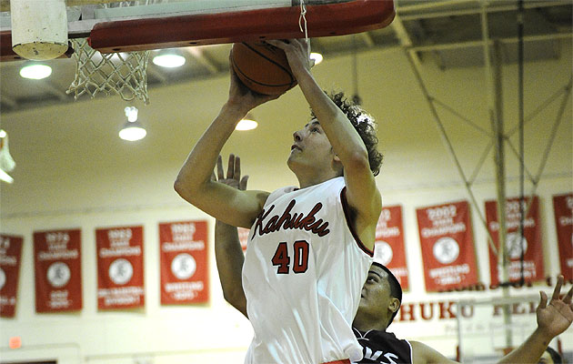 Kahuku's Denhym Brooke went to the hoop against Farrington on Saturday. Bruce Asato / Star-Advertiser