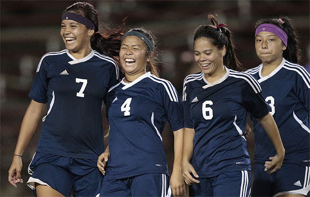 Moanalua's Hoku Afong, left to right, Rachel Inabata, Haley Graham and Alyssa Dela Pena celebrated with their team after winning 1-0 against Aiea. Honolulu Star-Advertiser photo by Krystle Marcellus