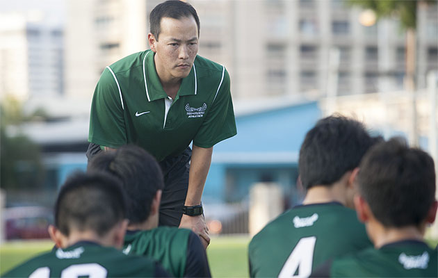 Coach Jayson Abe and his Mid-Pacific soccer players won a Division II state tite in 2015. The school won three state titles in various sports in the 2014-15 school year, the second most of any school in the state. Next year, if things go as planned , the Owls will be participating in all ILH and HHSAA sports except football and cheerleading. The school's athletes in those two sports will continue to play for the Pac-Five conglomerate for the foreseeable future. Kat Wade / Special to the Honolulu Star-Advertiser.